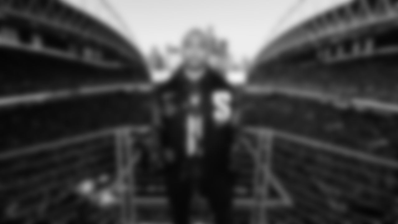 Seahawks Legend Doug Baldwin raising the flag in the 2025 Divisional Round on January 17, 2025.