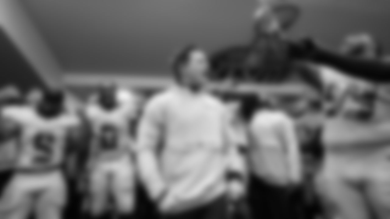 A fired-up Mike Macdonald celebrates with his team.