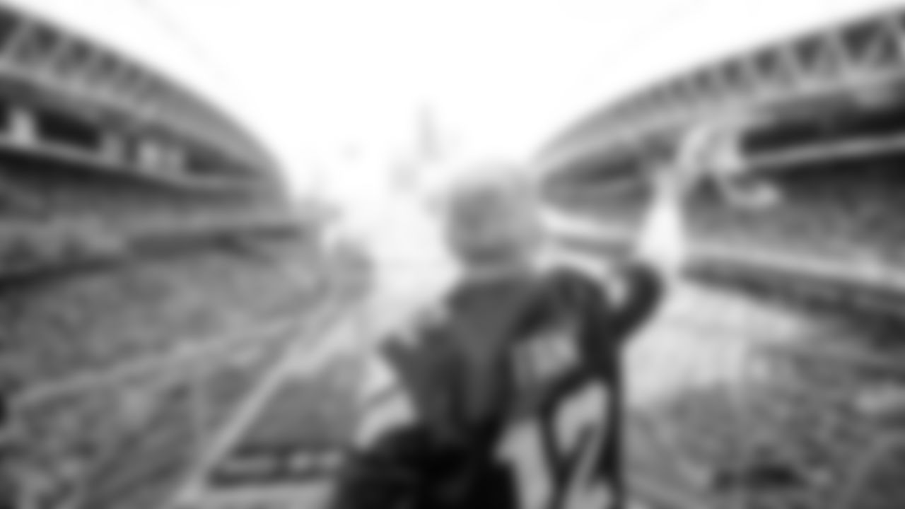 Brigadier General Richard Steve Ritchie "Cinco" of United States Air Force, raised the 12 Flag prior to kickoff of the Week 10 matchup vs. the Cardinals.