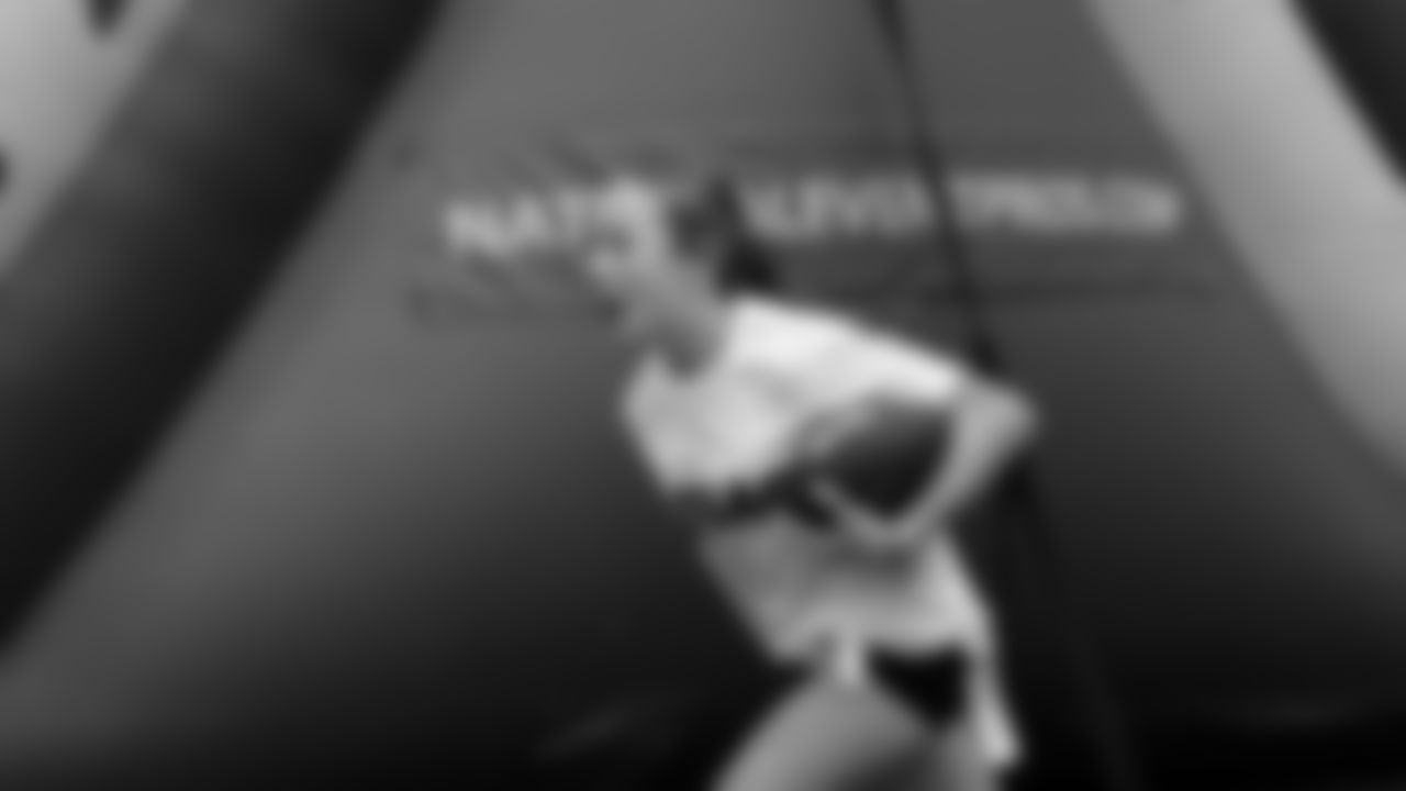 The Seahawks Women's Association packed girls flag kits and hosted a free girls flag football camp at the Seahawks training facility on Saturday, November 8, 2025.