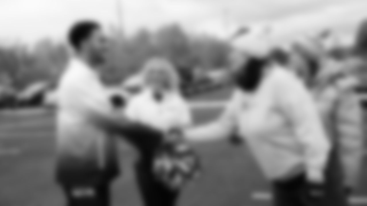 Seahawks Legend Marcus Trufant, quarterback Jalen Milroe, Blitz and the Seahawks Dancers participated in the Tacoma Police Department and Friends Thanksgiving Turkey Giveaway on November 18, 2025.