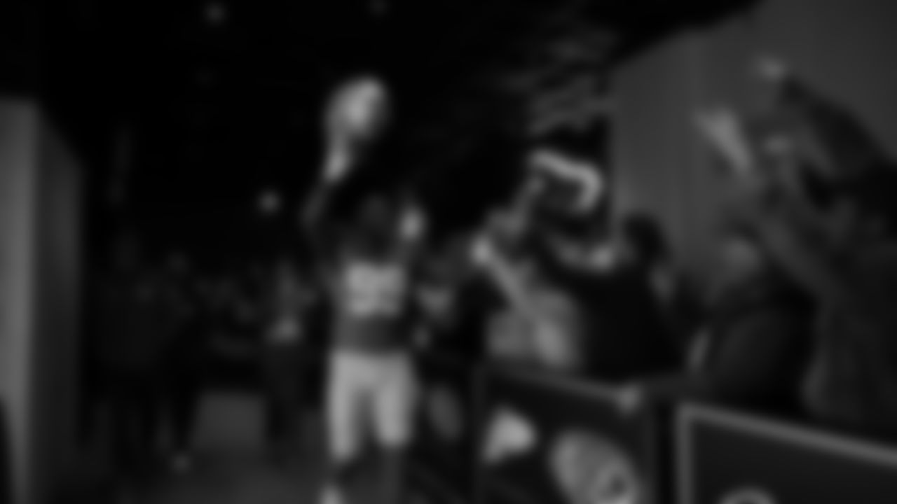 Seahawks defensive end Leonard Williams (99) walks through the Emerald Queen Casino tunnel club at Lumen Field for the Week 13 matchup vs. the Vikings.