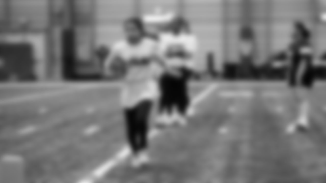 The Seahawks Women's Association packed girls flag kits and hosted a free girls flag football camp at the Seahawks training facility on Saturday, November 8, 2025.