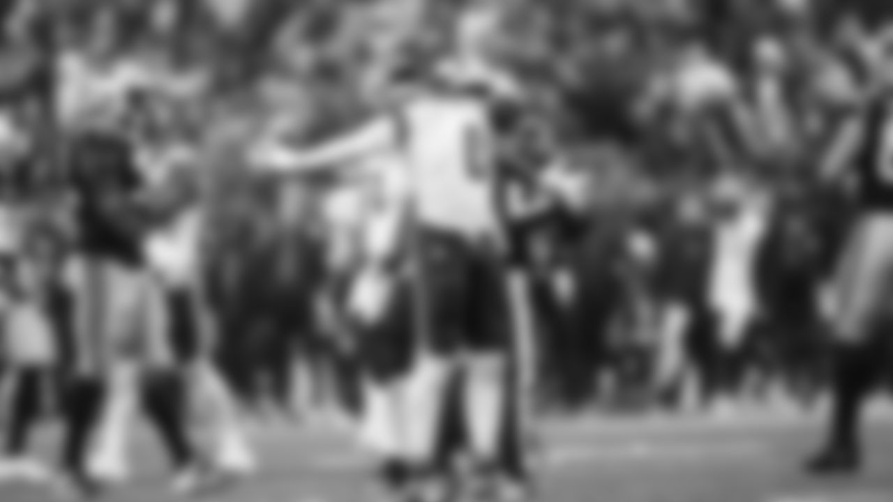 DeMarcus Lawrence celebrates after sacking Carolina's Bryce Young in the fourth quarter.