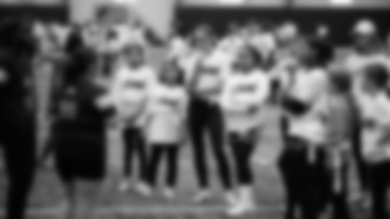 The Seahawks Women's Association packed girls flag kits and hosted a free girls flag football camp at the Seahawks training facility on Saturday, November 8, 2025.