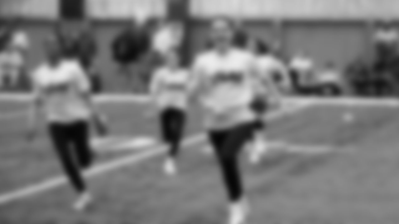 The Seahawks Women's Association packed girls flag kits and hosted a free girls flag football camp at the Seahawks training facility on Saturday, November 8, 2025.