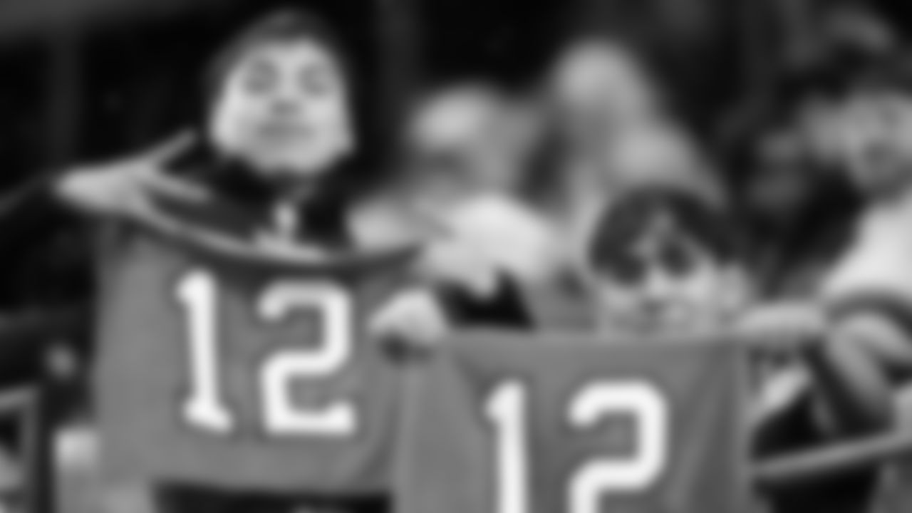 The fans show their support through the rainy weather for the second preseason game of the year against the Kansas City Chiefs.
