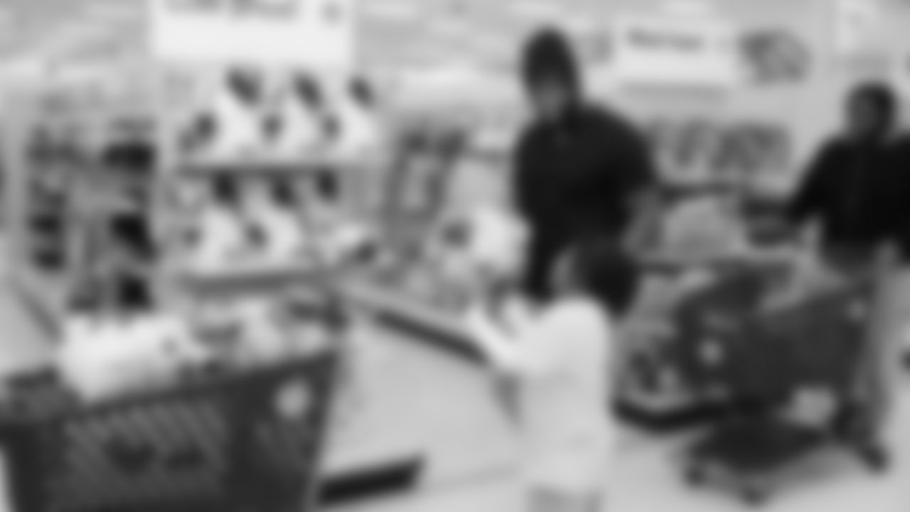 Seahawks offensive lineman Josh Jones was joined by fellow offensive linemen as they hosted a holiday shopping spree for kids from the Boys & Girls Club on December 9, 2025.