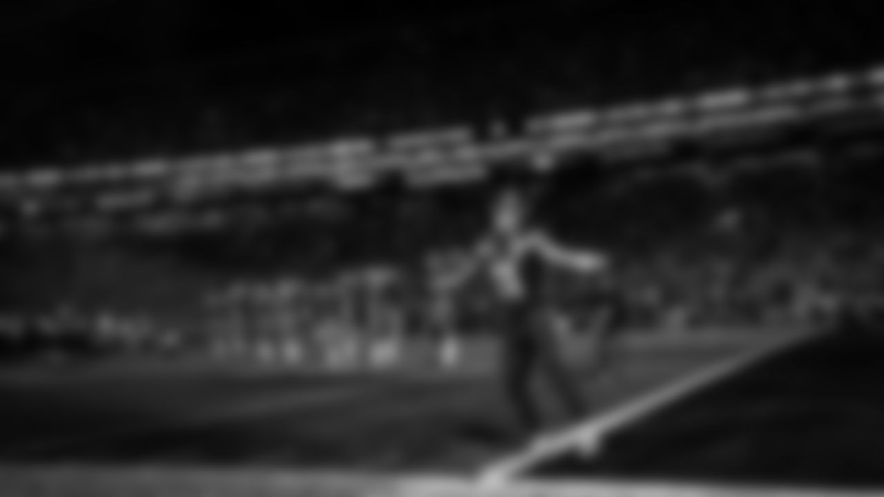 Receiver Jaxon Smith-Njigba soaks in the energy of the 12s as he is introduced with the Seahawks starters.