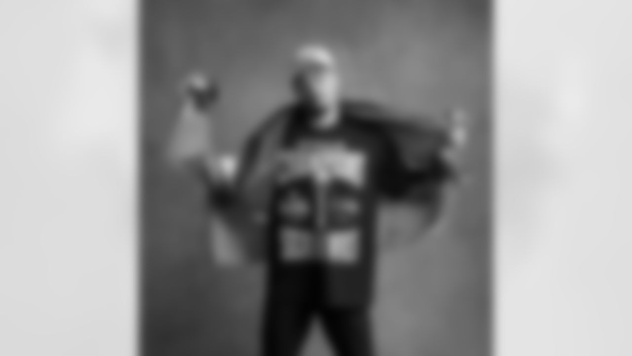 Seahawks wide receiver Jaxon Smith-Njigba (11) with the Lombardi Trophy after winning Super Bowl LX.