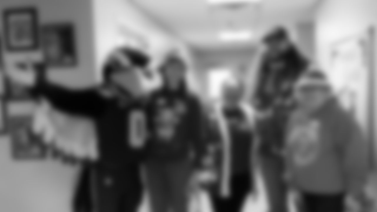 Seahawks Fullback Brady Russell, the Seahawks Dancers, and Blitz spent the day volunteering at Santa's Castle on Joint Base Lewis-McChord to celebrate the holidays and support service members and their families.