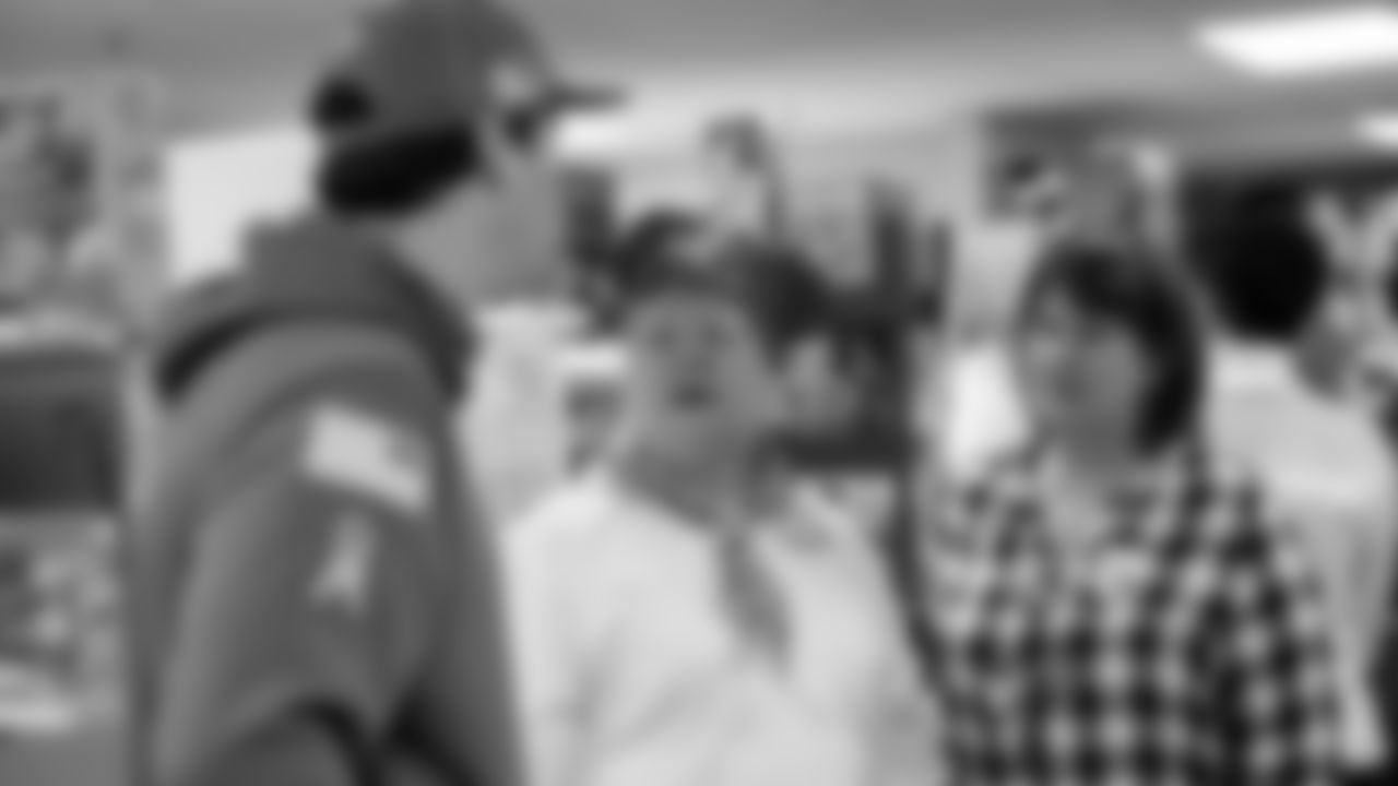 Seahawks Fullback Brady Russell, the Seahawks Dancers, and Blitz spent the day volunteering at Santa's Castle on Joint Base Lewis-McChord to celebrate the holidays and support service members and their families.