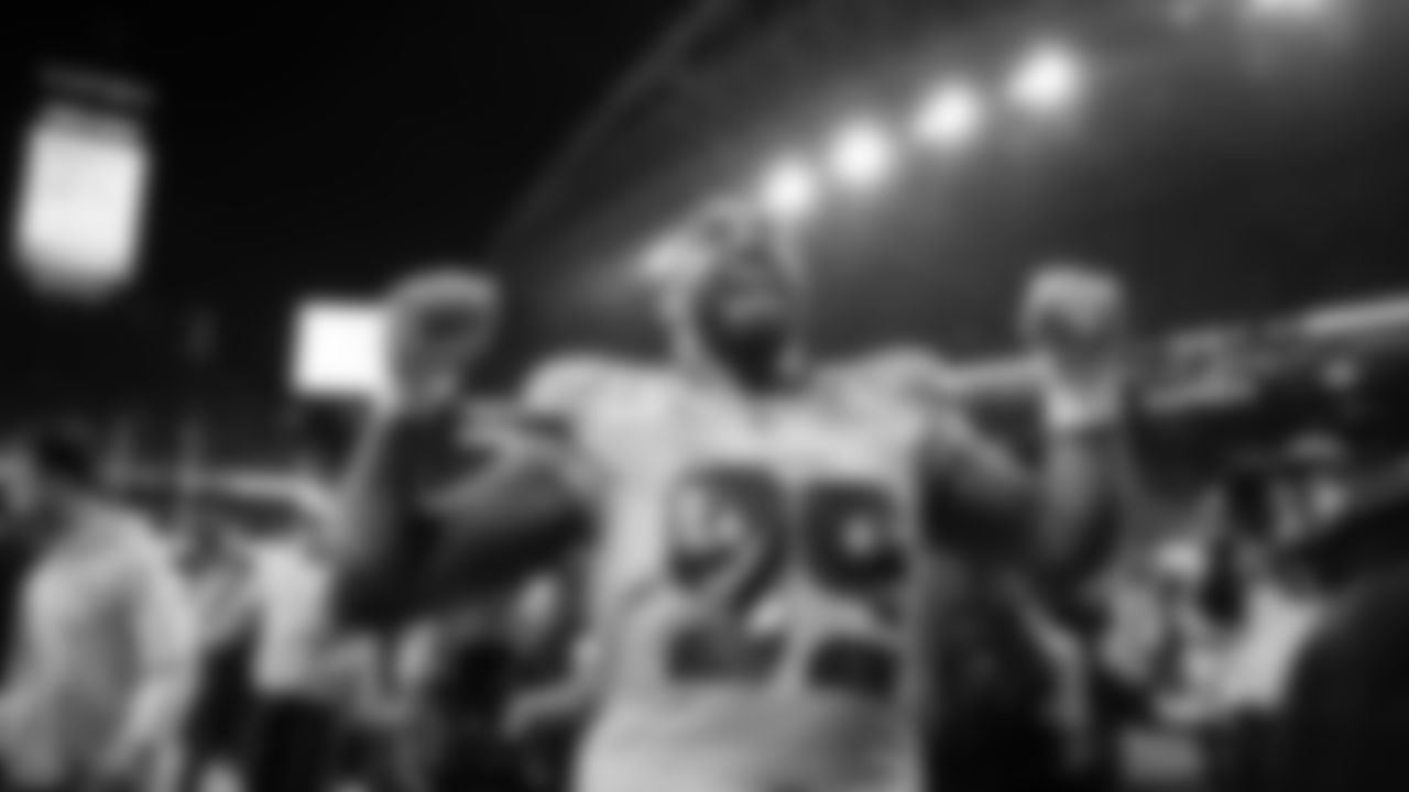 Seahawks defensive lineman Leonard Williams celebrates as he heads off the field after the win.