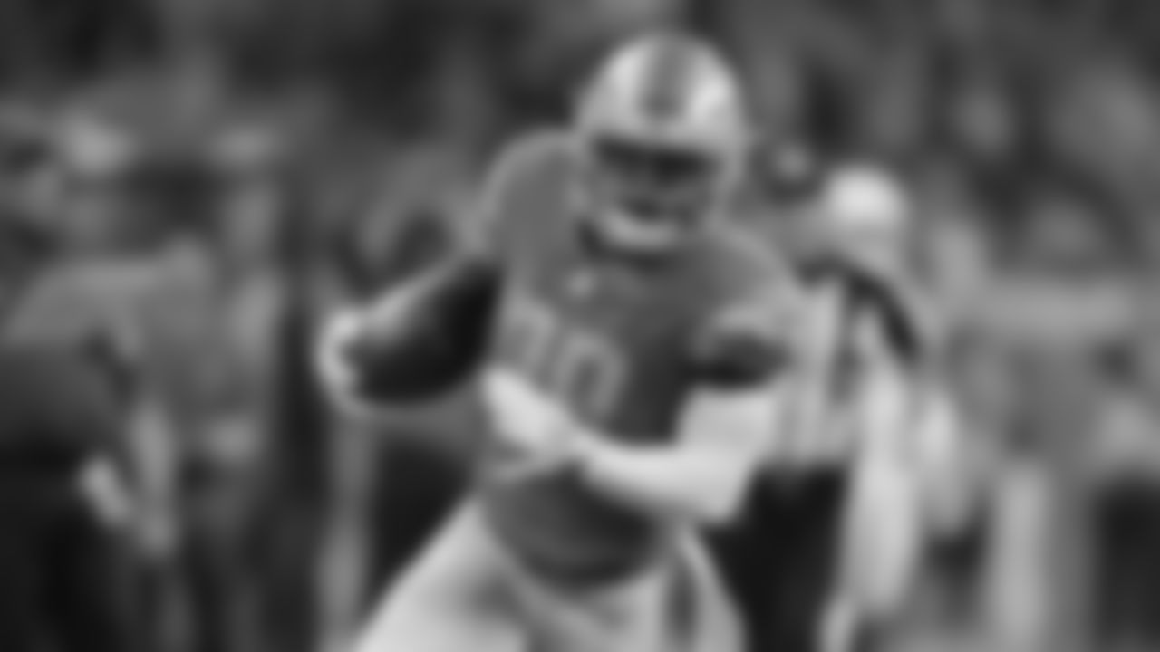 Detroit Lions cornerback Quandre Diggs (28) carries the ball against the Arizona Cardinals during the first half of an NFL football game in Detroit, Sunday, Sept. 10, 2017. (AP Photo/Duane Burleson)