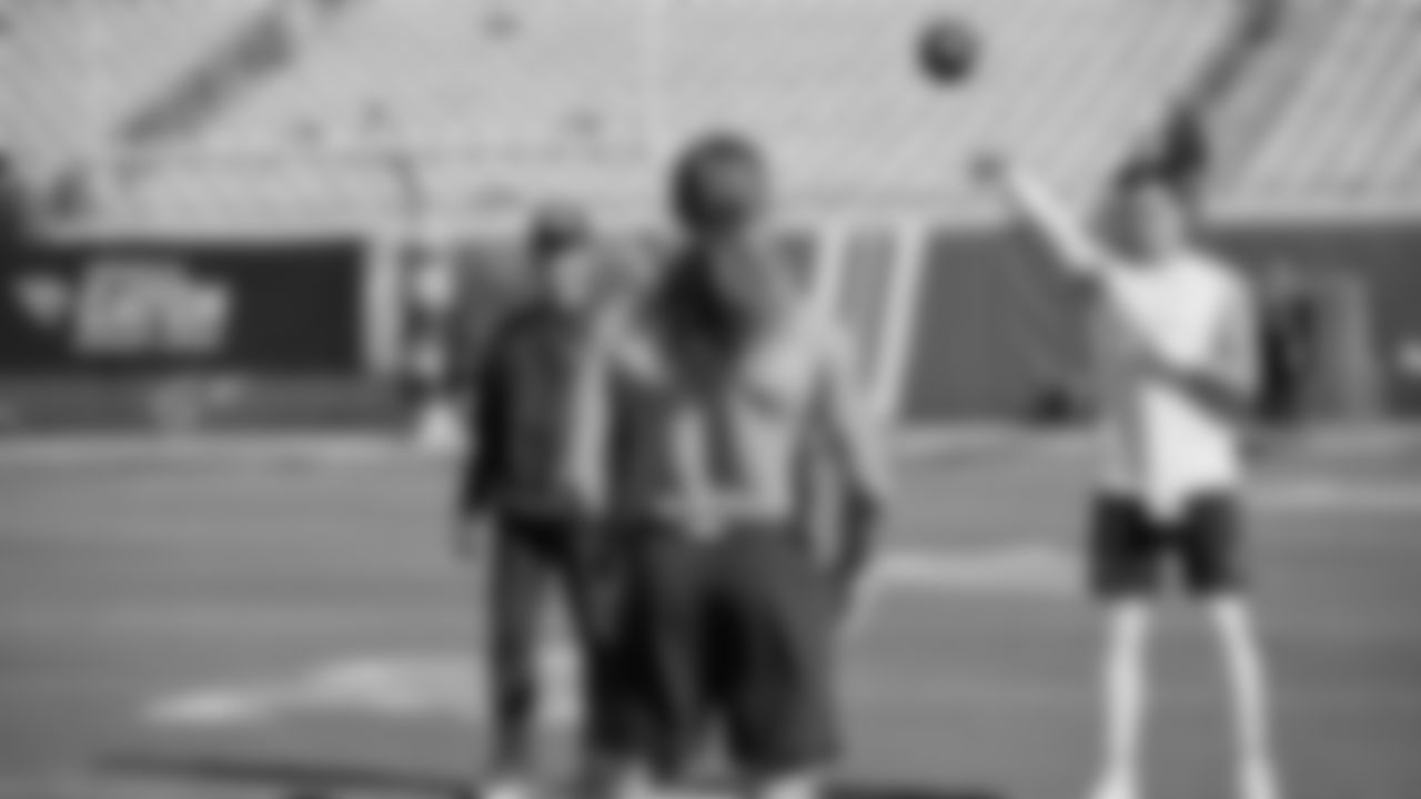 Seahawks quarterback Drew Lock (2) and Seahawks fullback Brady Russell (38) warm up at EverBank Stadium on October 12, 2025.