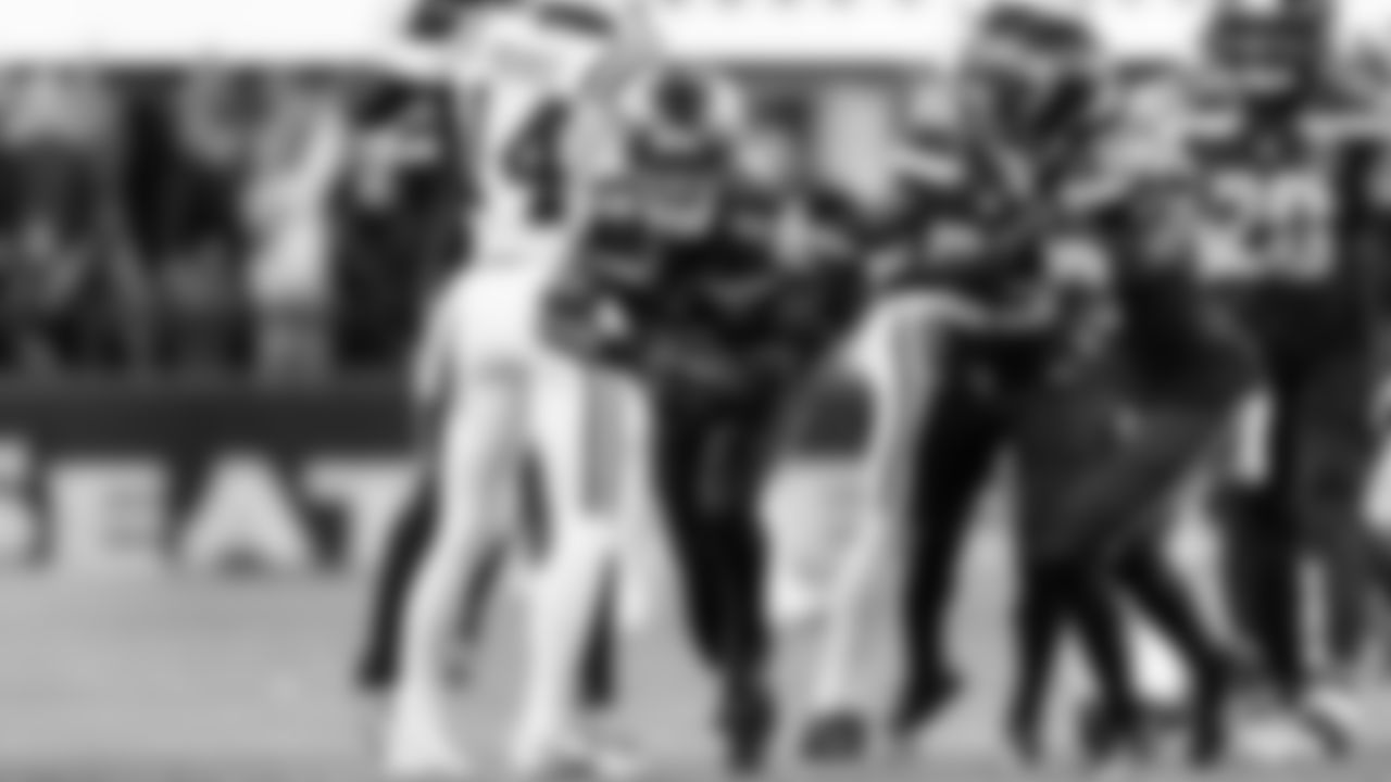 Seahawks safety Coby Bryant comes up with the ball after his interception sealed the victory for Seattle.