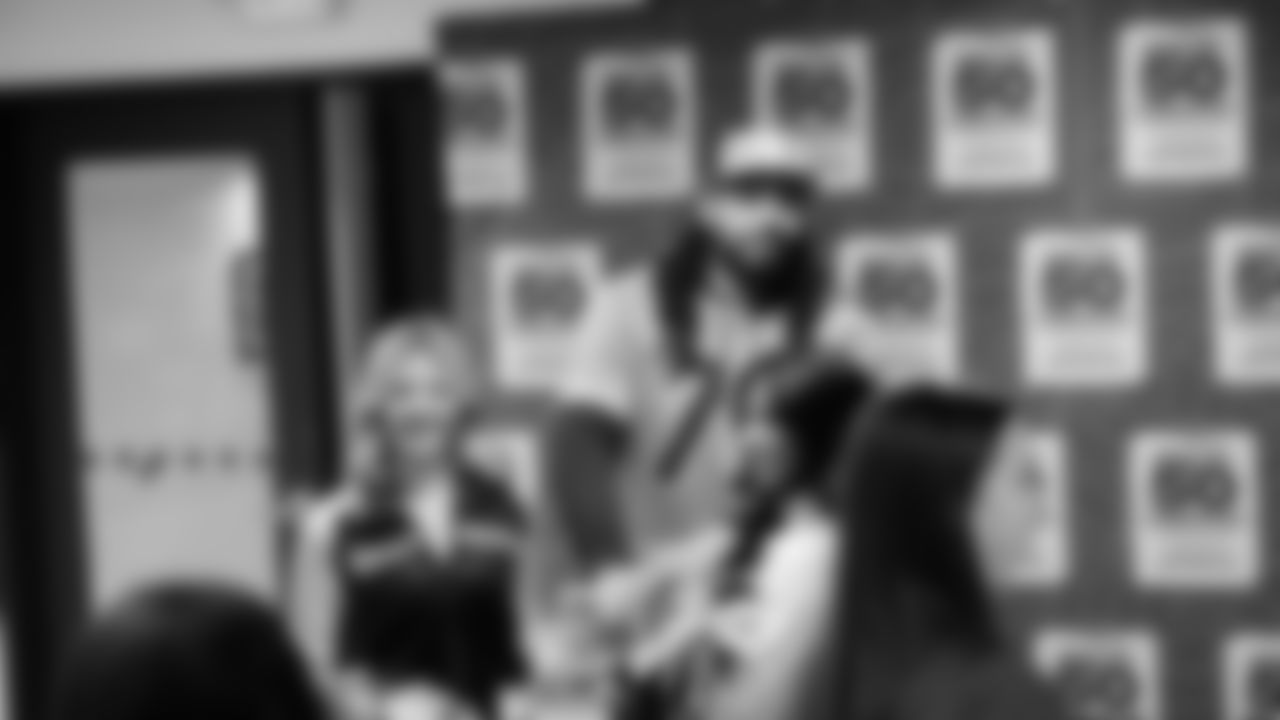 Seahawks Legend Garry Gilliam and Seahawks Dancers surprised teens at the Lake Hills Boys & Girls Club for a fun afternoon of Seahawks activities and crafting. One lucky winner also went home with two tickets to the Divisional Playoff game!