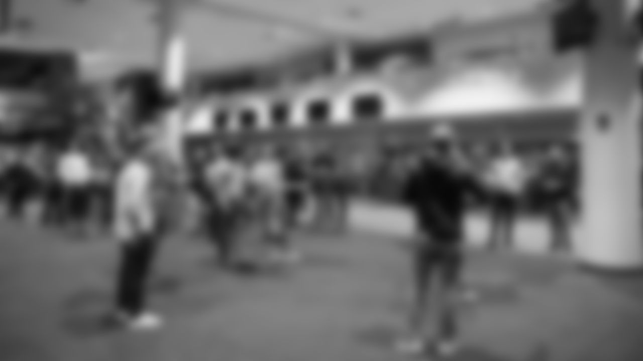 The Seahawks donated $2,500 to the Coast Guard Foundation and surprised 100 service members and their families with Seahawks talent and swag during their holiday event on December 11, 2025.