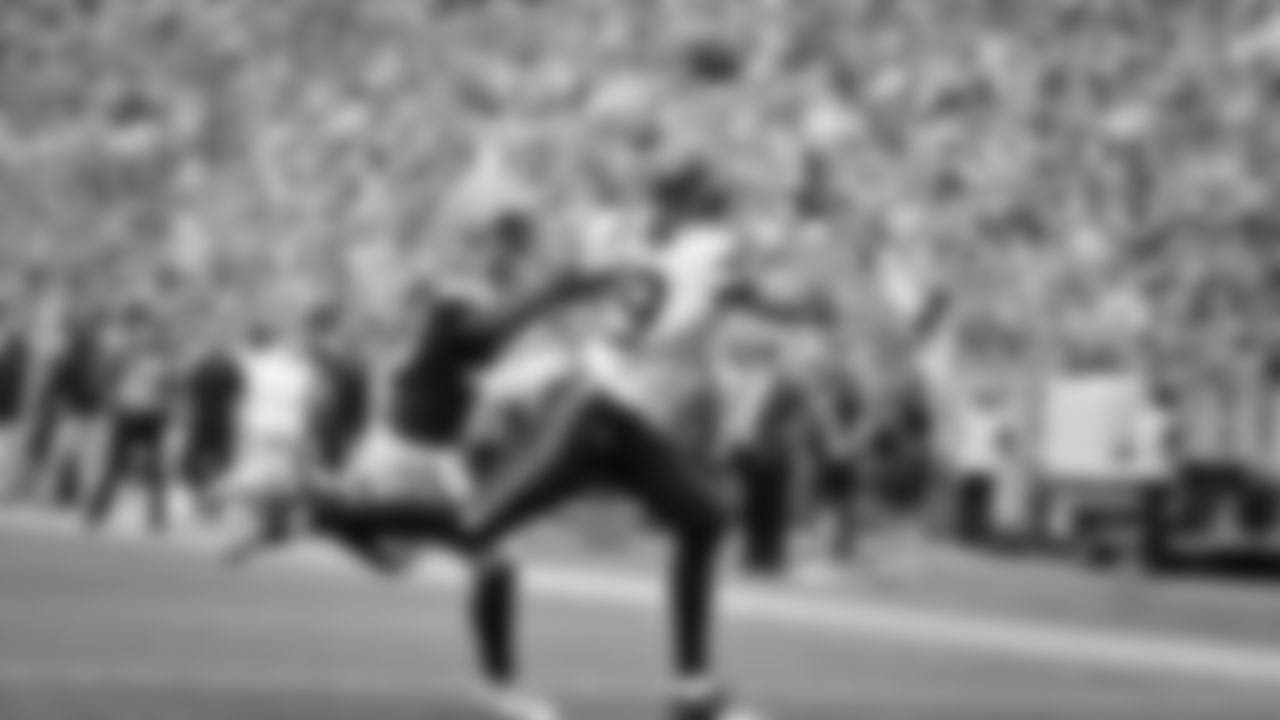 Undrafted free-agent receiver Jake Bobo gets open and catches a touchdown pass from Drew Lock.