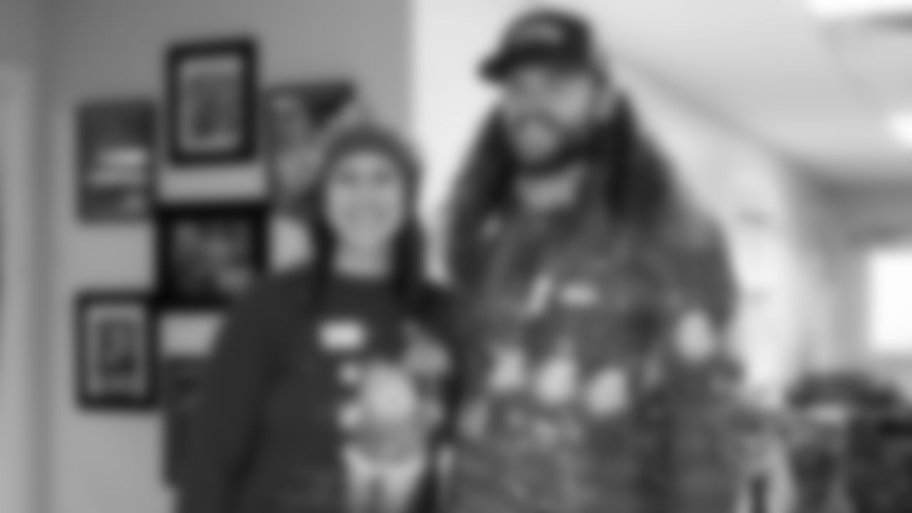 Seahawks Fullback Brady Russell, the Seahawks Dancers, and Blitz spent the day volunteering at Santa's Castle on Joint Base Lewis-McChord to celebrate the holidays and support service members and their families.