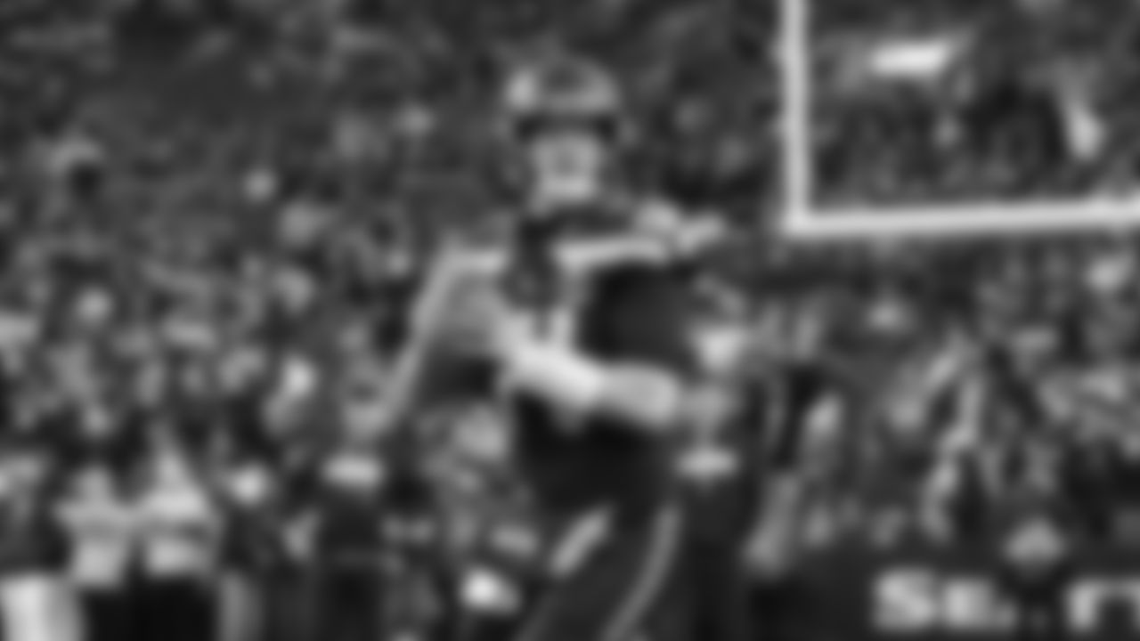 Seahawks quarterback Sam Darnold (14) warms up at Lumen Field for the NFC divisional round game vs. the San Francisco 49ers on January 17, 2026.