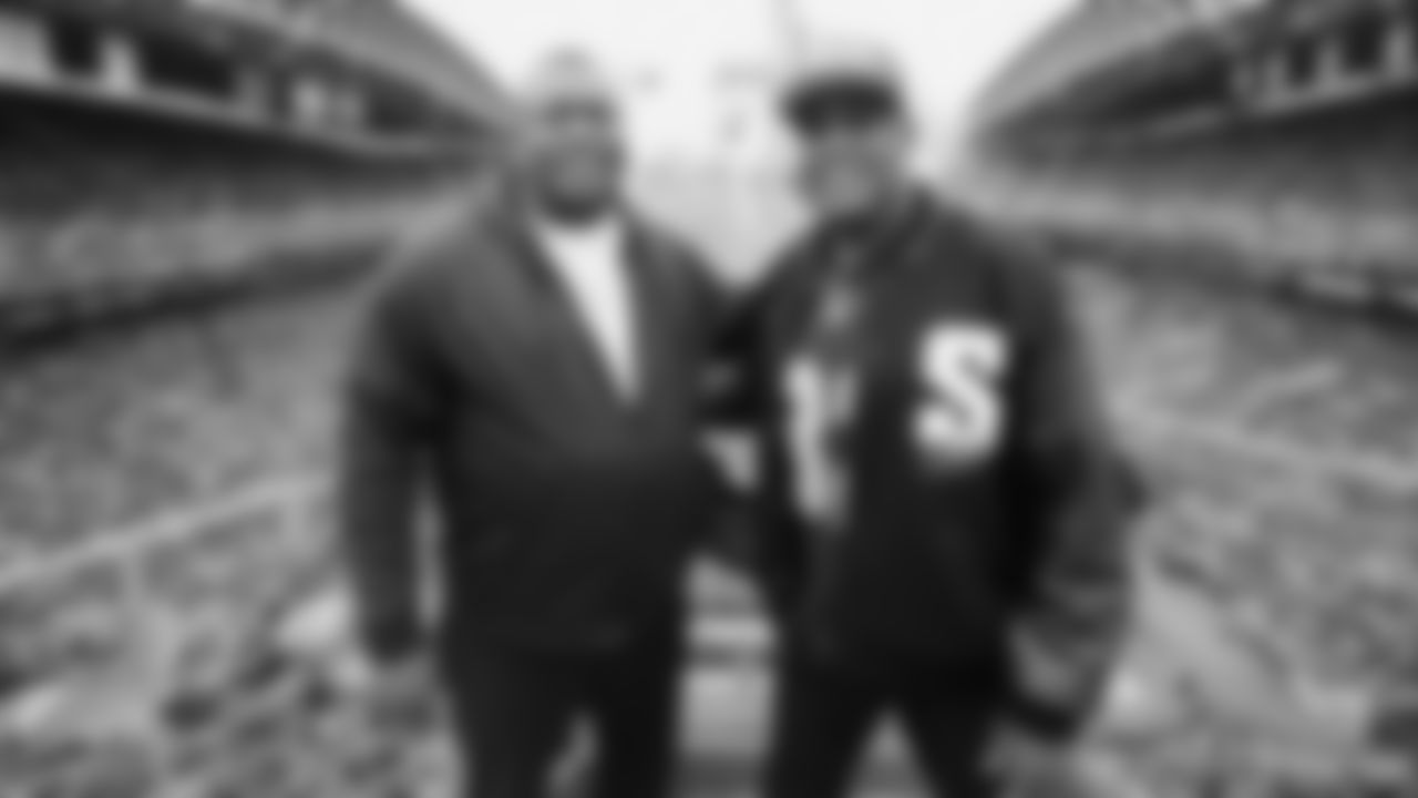 Seahawks Legends Rufus Porter and John L. Williams raise 12 flag in week 15 on December 14, 2025