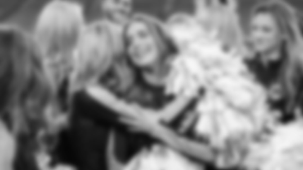 Miranda finds out she is the Dancer of the Day during pregame rehearsal.