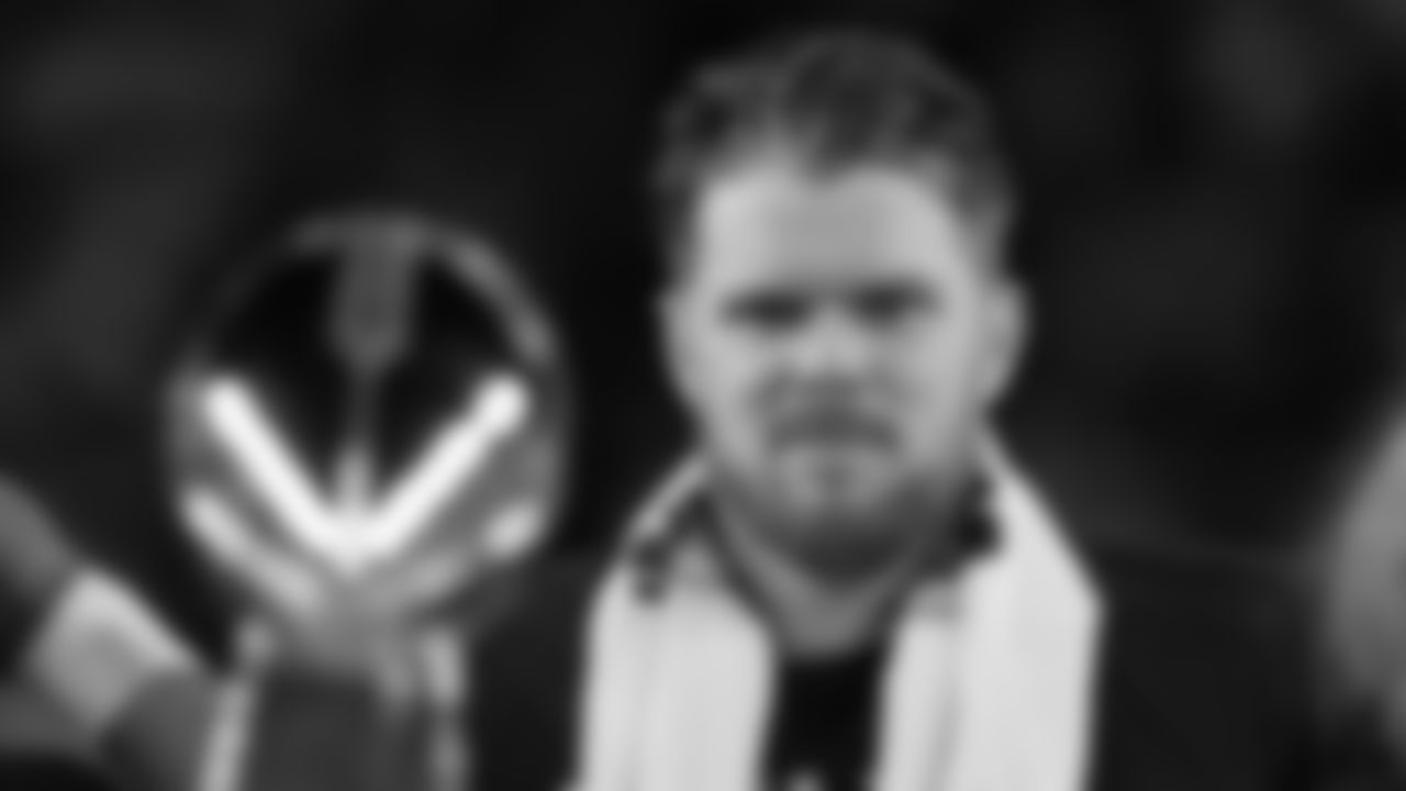 Seattle Seahawks quarterback Sam Darnold eyes the Lombardi Trophy after a win over the New England Patriots in the NFL Super Bowl 60 football game Sunday, Feb. 8, 2026, in Santa Clara, Calif. (AP Photo/Matt Slocum)