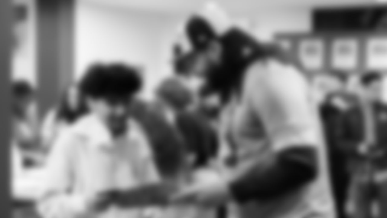 Seahawks Legend Garry Gilliam and Seahawks Dancers surprised teens at the Lake Hills Boys & Girls Club for a fun afternoon of Seahawks activities and crafting. One lucky winner also went home with two tickets to the Divisional Playoff game!