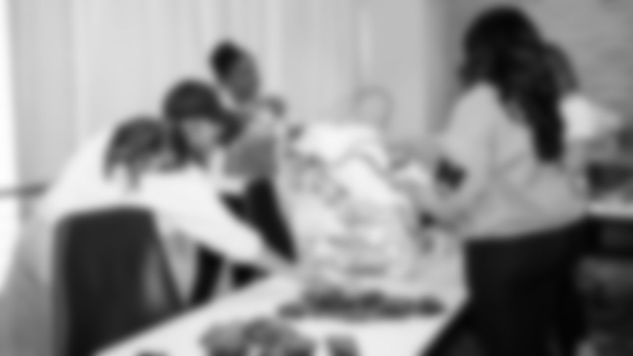 The Seahawks Women's Association packed girls flag kits and hosted a free girls flag football camp at the Seahawks training facility on Saturday, November 8, 2025.