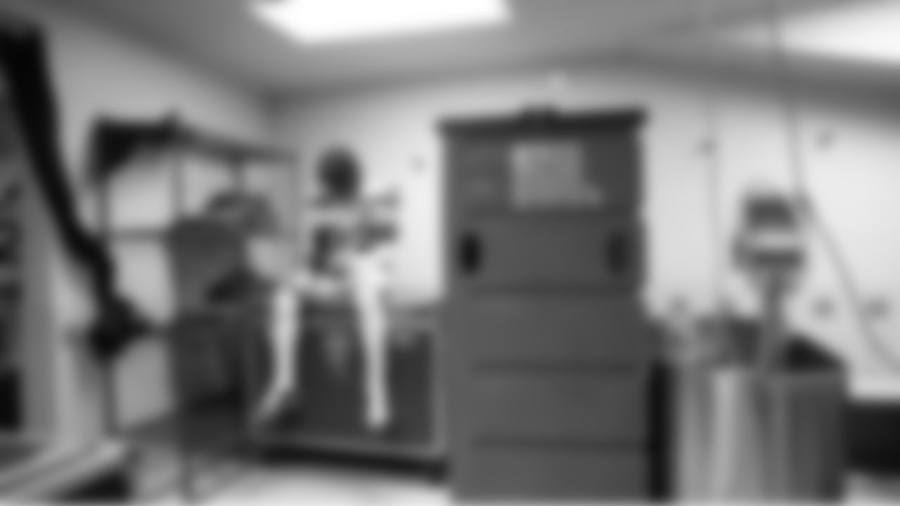 Back in the locker room, receiver Rashid Shaheed takes a moment to himself.