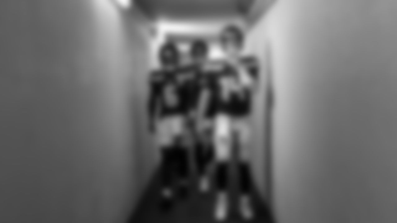 Seahawks quarterback Jalen Milroe (6), quarterback Drew Lock (2) and quarterback Sam Darnold (14) warms up at Lambeau Field for the preseason Week 3 matchup vs. the Green Bay Packers.
