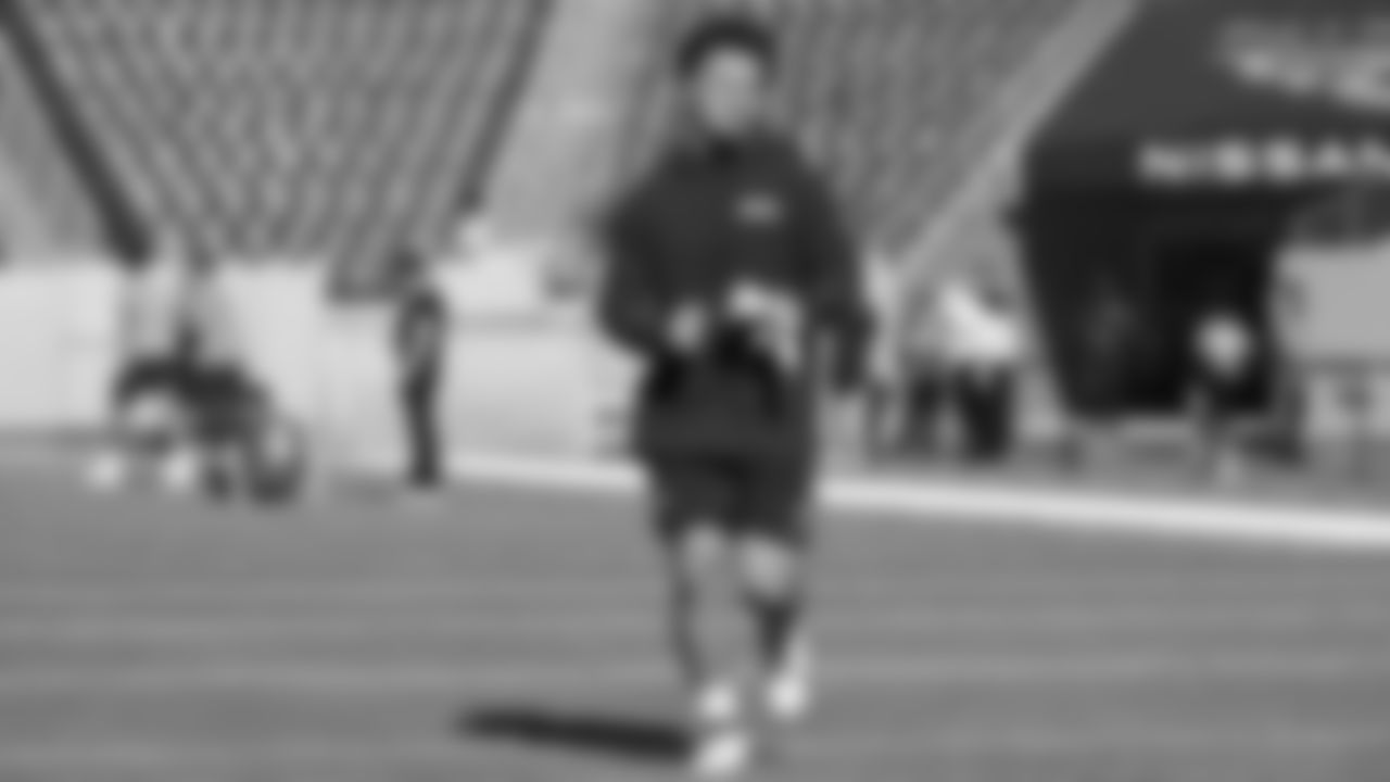 Seahawks running back George Holani (36) hit the field at Nissan Stadium for the Week 12 matchup vs. the Titans in Nashville, Tennessee.