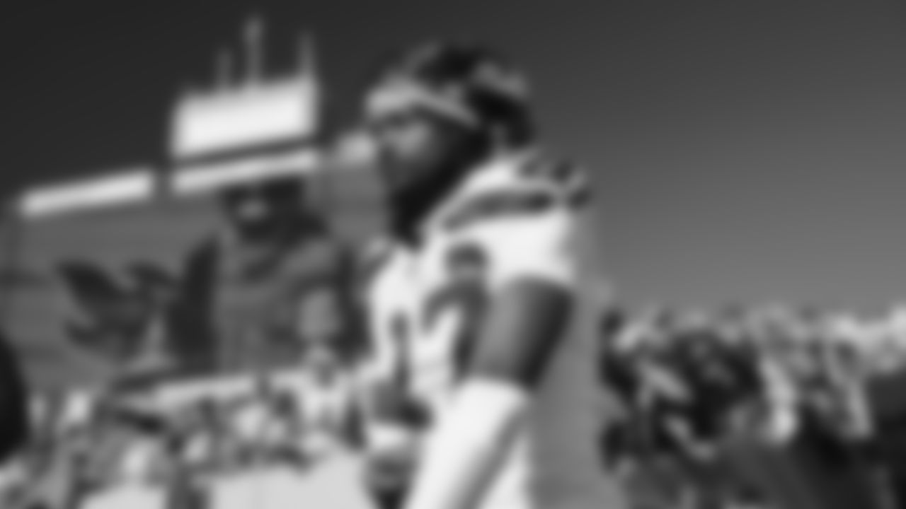 Seahawks cornerback Riq Woolen (27) hit the field at Nissan Stadium for the Week 12 matchup vs. the Titans in Nashville, Tennessee.