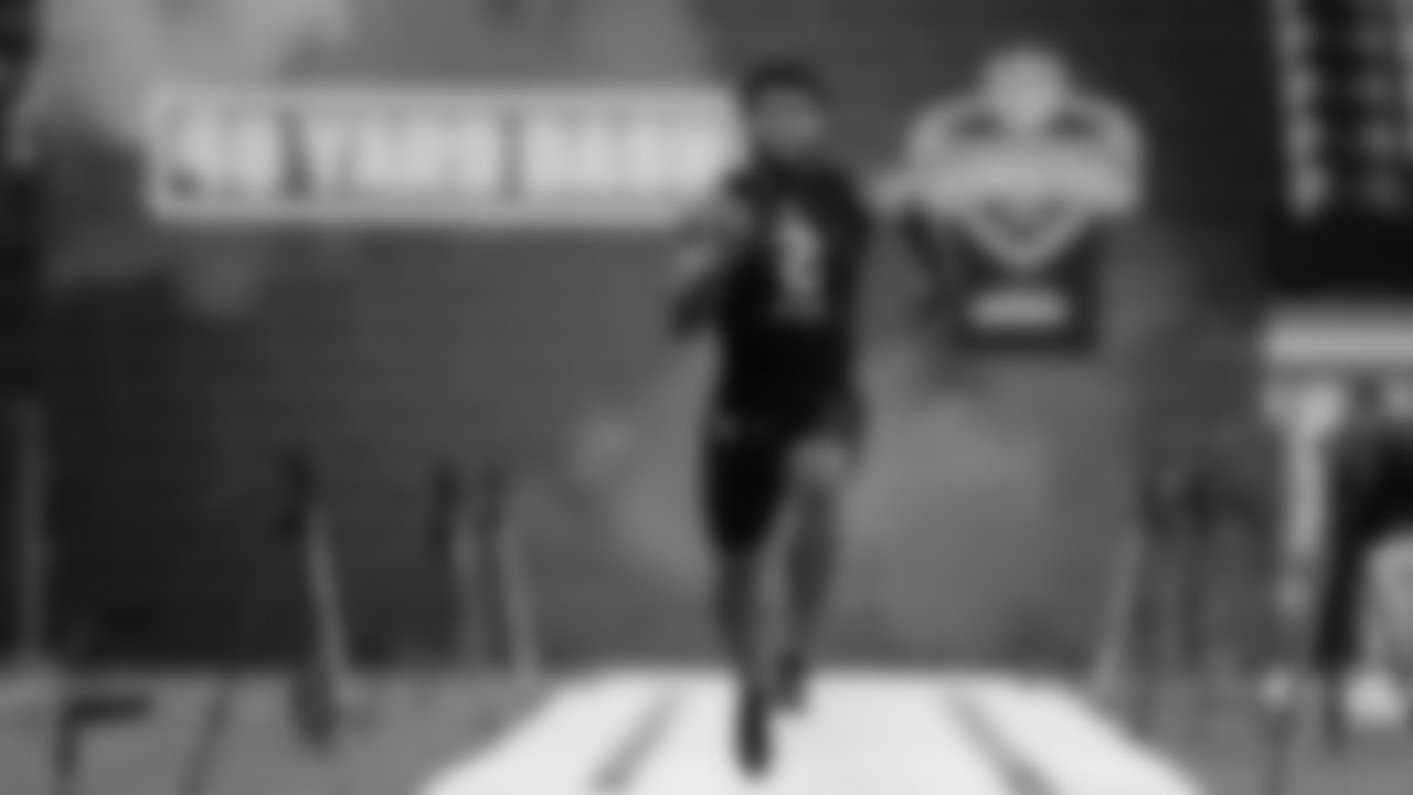 Florida State running back Cam Akers runs the 40-yard dash at the NFL football scouting combine in Indianapolis, Friday, Feb. 28, 2020. (AP Photo/Michael Conroy)