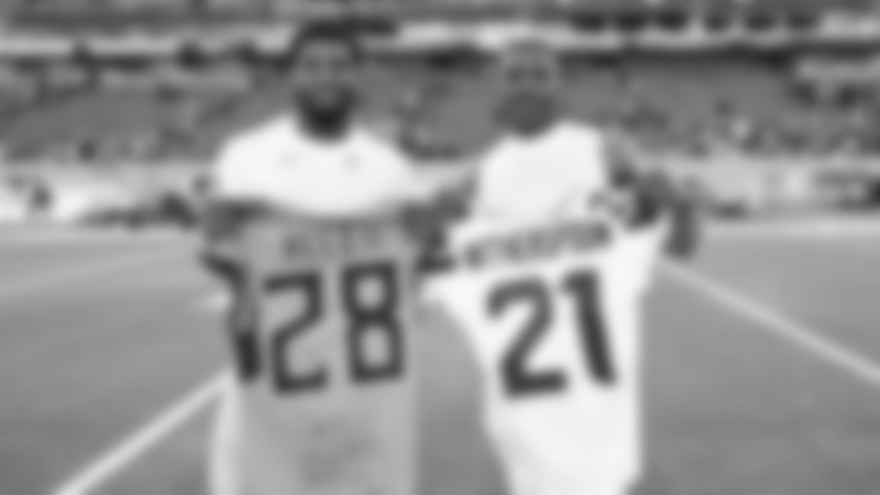 Seahawks celebrate the 30-24 win over the Tennessee Titans at Nissan Stadium on November 23, 2025.