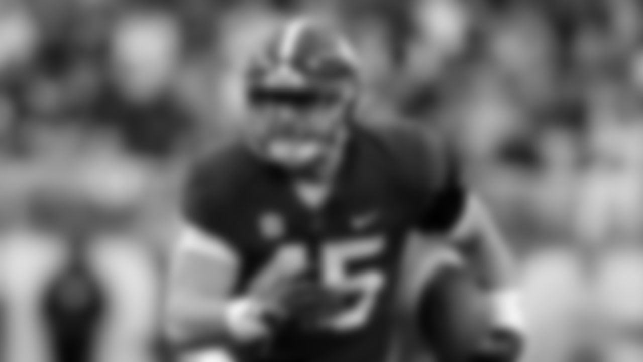 Alabama tight end Robbie Ouzts carries the ball after a reception against Auburn during the first half of an NCAA college football game Saturday, Nov. 26, 2022, in Tuscaloosa, Ala. (AP Photo/Butch Dill)