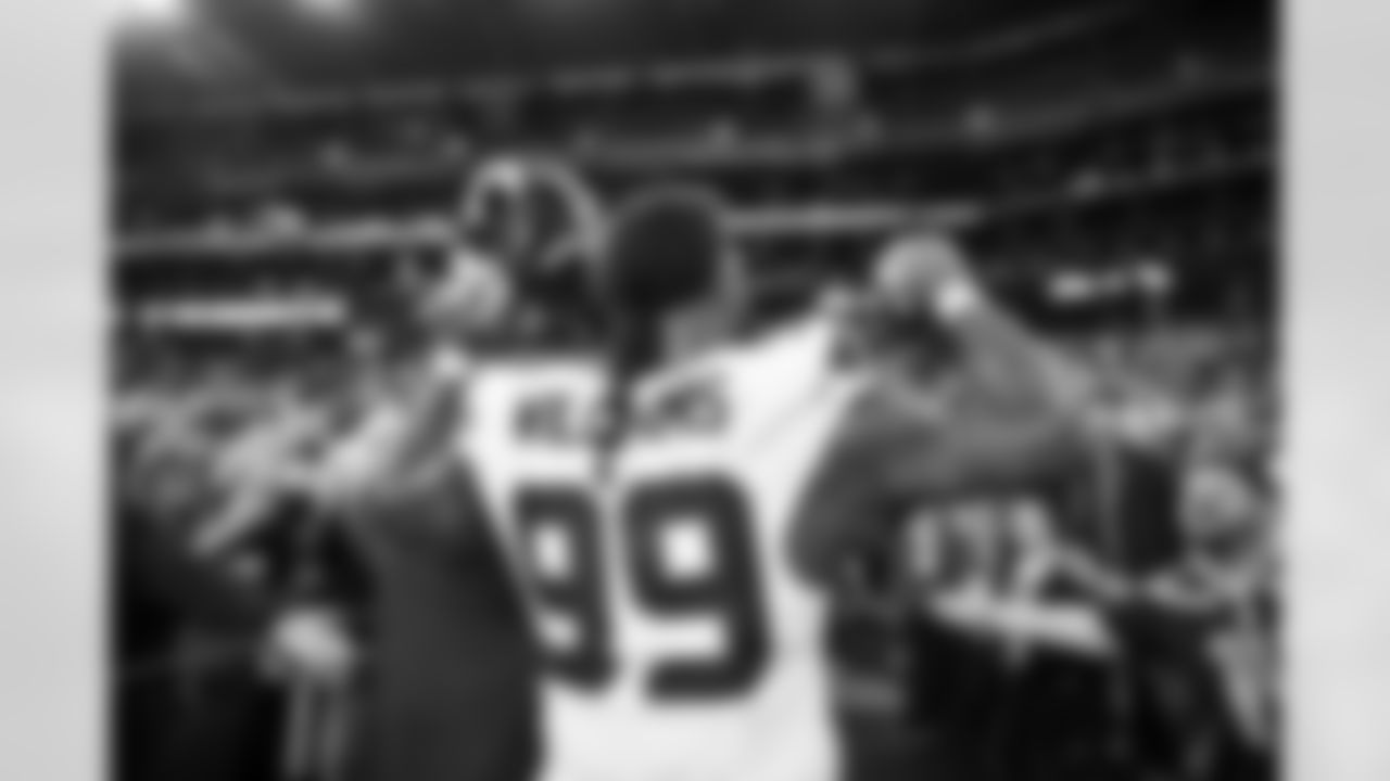 Seahawks defensive end Leonard Williams (99) celebrates the Week 14 win over the Arizona Cardinals on Sunday, December 8, 2024 at State Farm Stadium in Glendale, Arizona.