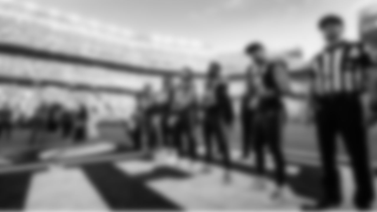 Seahawks game captains, Cooper Kupp, Leonard Williams, Brady Russell, Devon Witherspoon and Jaxon Smith-Njigba at midfield awaiting the coin toss.