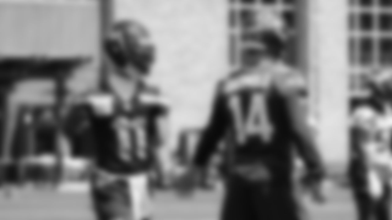 Seahawks wide receiver Jaxon Smith-Njigba (11) and quarterback Sam Darnold (14) participated in a workout on day four of OTAs on Monday, June 2, 2025 at the Virginia Mason Athletic Center.