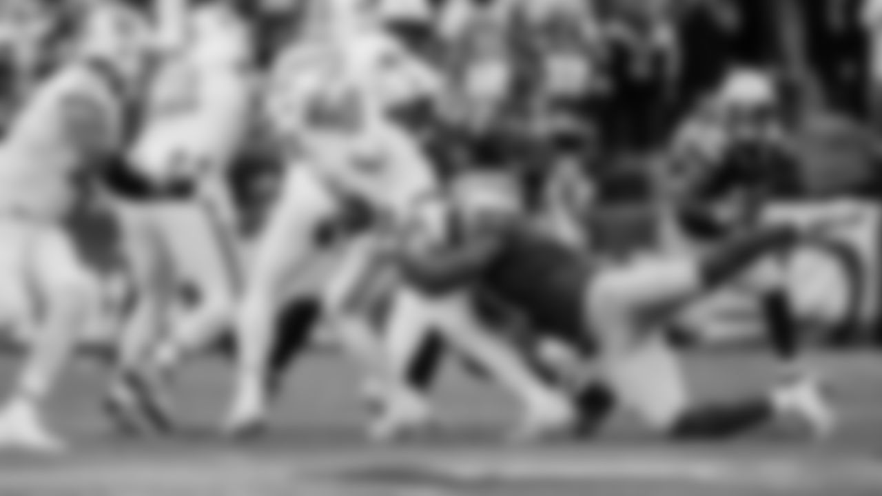 Seahawks linebacker Uchenna Nwosu sacks Bucs quarterback Baker Mayfield.