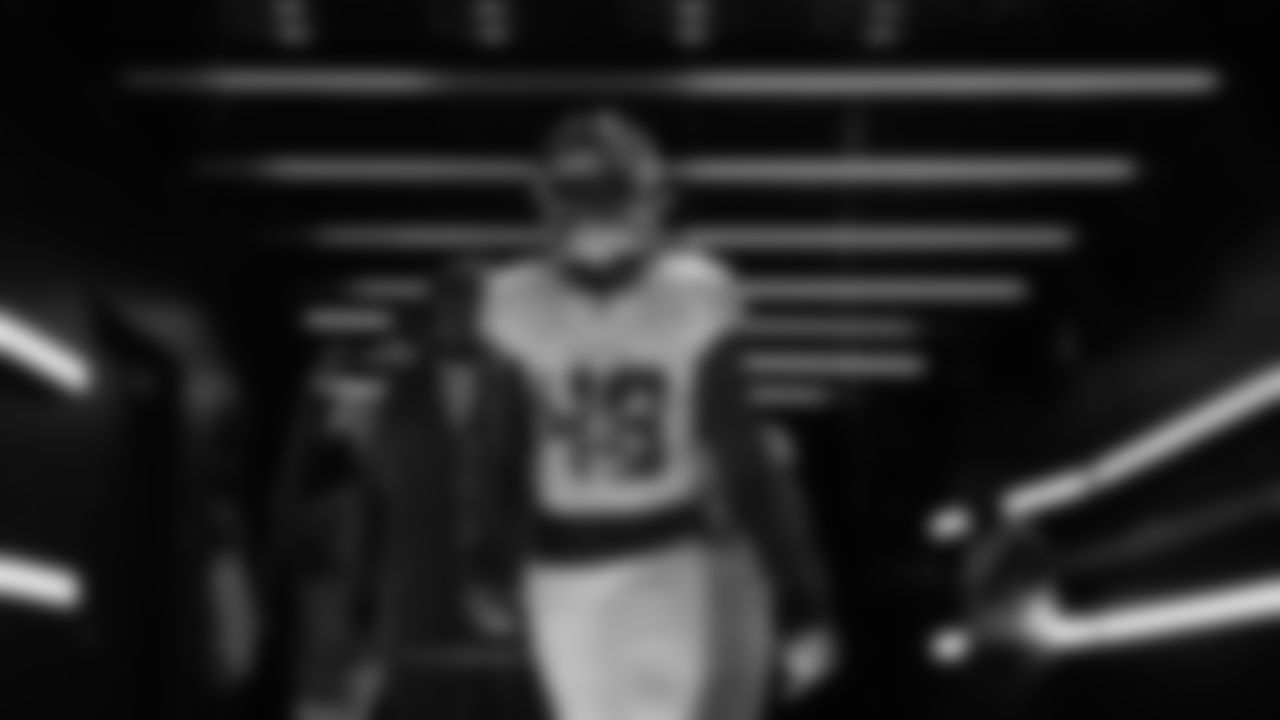 Seahawks linebacker Tyrice Knight (48) walks through the Emerald Queen Casino tunnel club at Lumen Field for the Week 16 matchup vs. Rams.