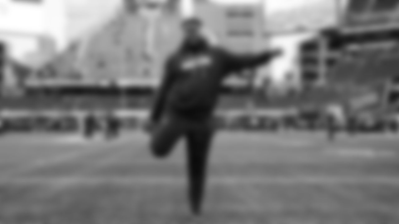 Seahawks center Olu Oluwatimi (55) warms up at Lumen Field for the Week 15 matchup vs. the Indianapolis Colts.