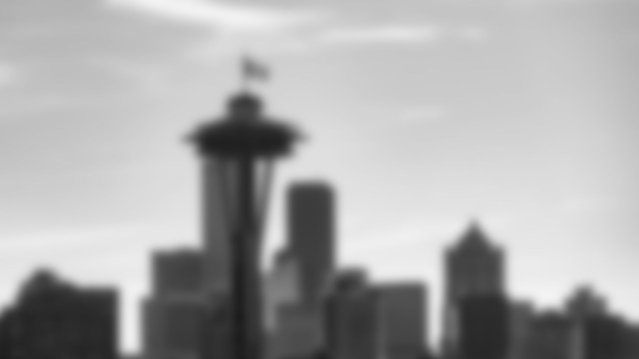 Seahawks Legends Walter Jones and Lofa Tatupu raised the 12 Flag on top of the Space Needle in honor of Blue Friday on January 16, 2026.