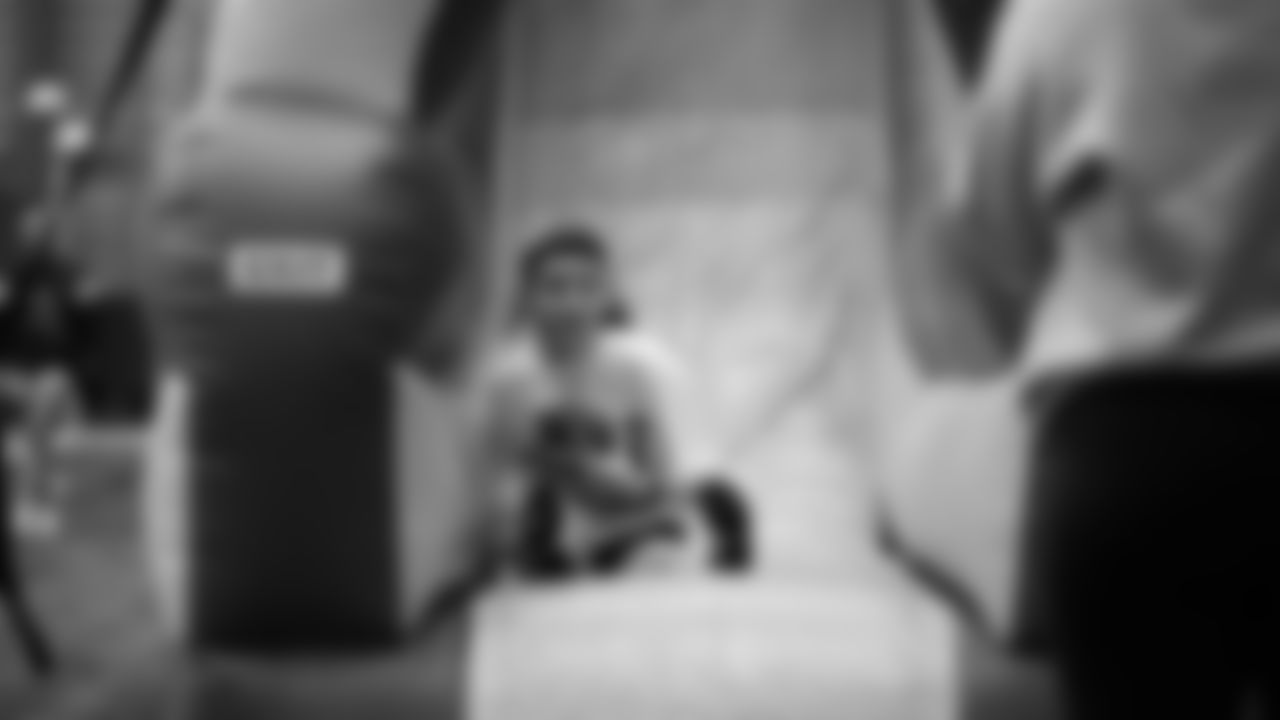 The Seahawks Women's Association packed girls flag kits and hosted a free girls flag football camp at the Seahawks training facility on Saturday, November 8, 2025.