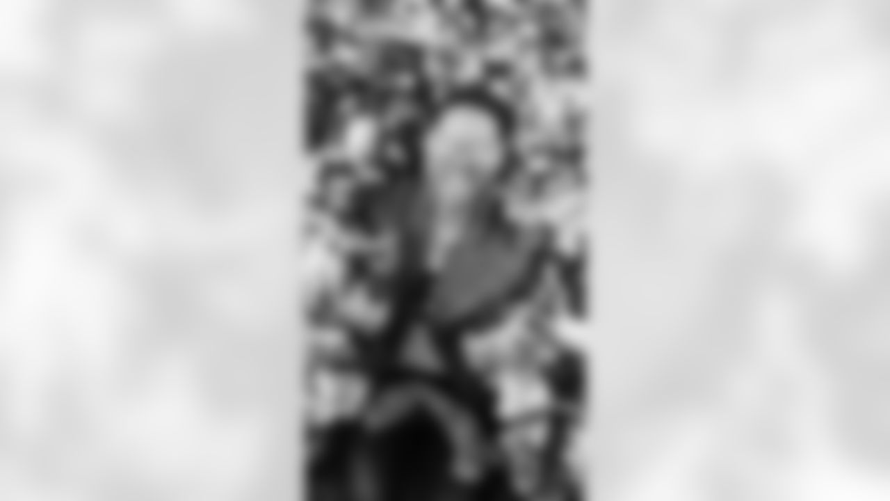 Jaedin celebrates the win with teammates wearing the Seahawks iconic W glasses!