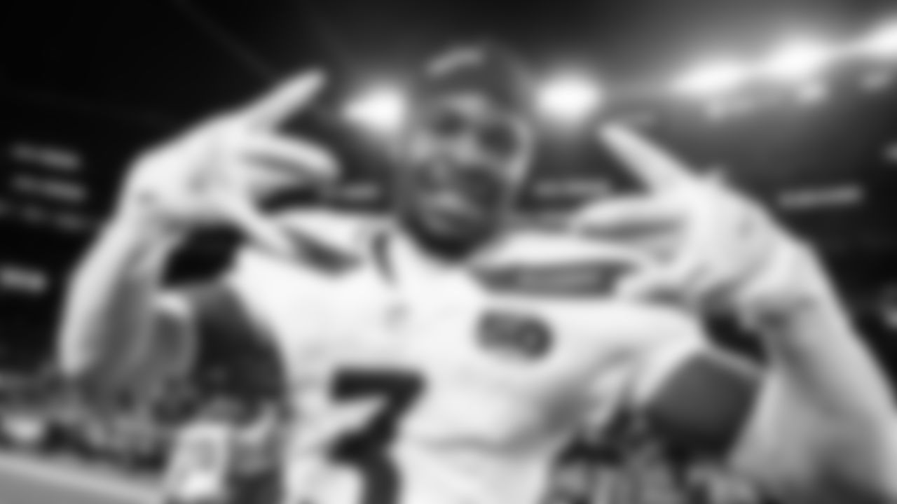 Seahawks safety Nick Emmanwori celebrates the win.