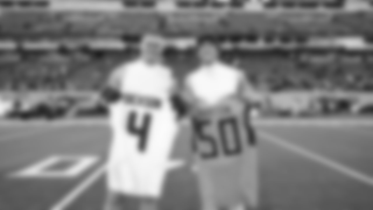 Seahawks celebrate the 30-24 win over the Tennessee Titans at Nissan Stadium on November 23, 2025.