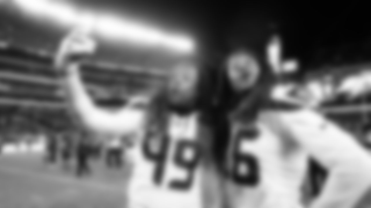 Shaquem and Shaquill Griffin strike poses as the film video segments for Seahawks fans after the game.
