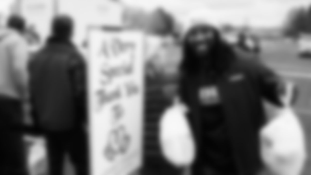 Seahawks Legend Marcus Trufant, quarterback Jalen Milroe, Blitz and the Seahawks Dancers participated in the Tacoma Police Department and Friends Thanksgiving Turkey Giveaway on November 18, 2025.